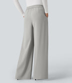 Pantalon tailleur large taille haute croisée avec poches