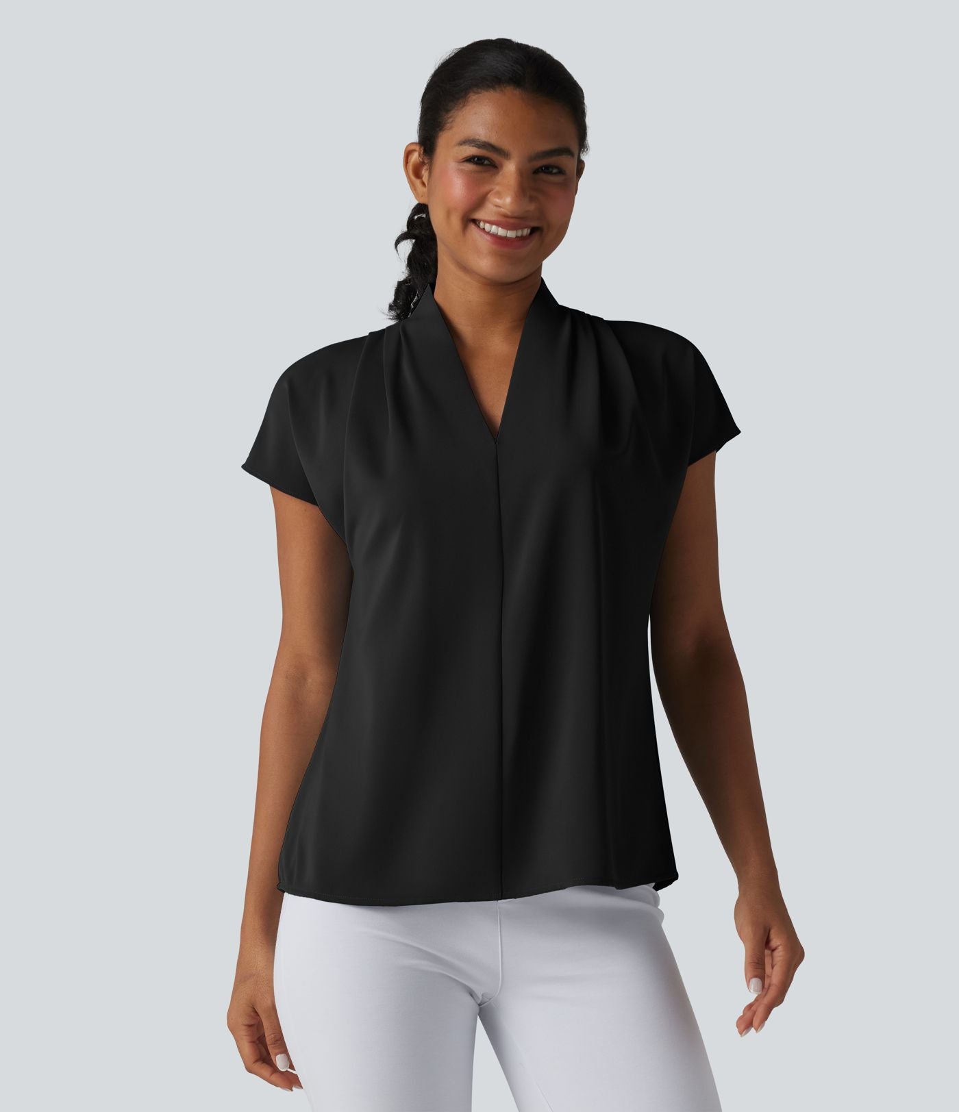 Blouse esprit bureau ample défroissage facile, col V et manches chauve-souris