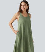 Robe midi fluide à dos nageur, soutien-gorge intégré, ourlet asymétrique et poches
