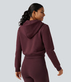 Veste de sport polaire à capuche, manches longues, zip et poches