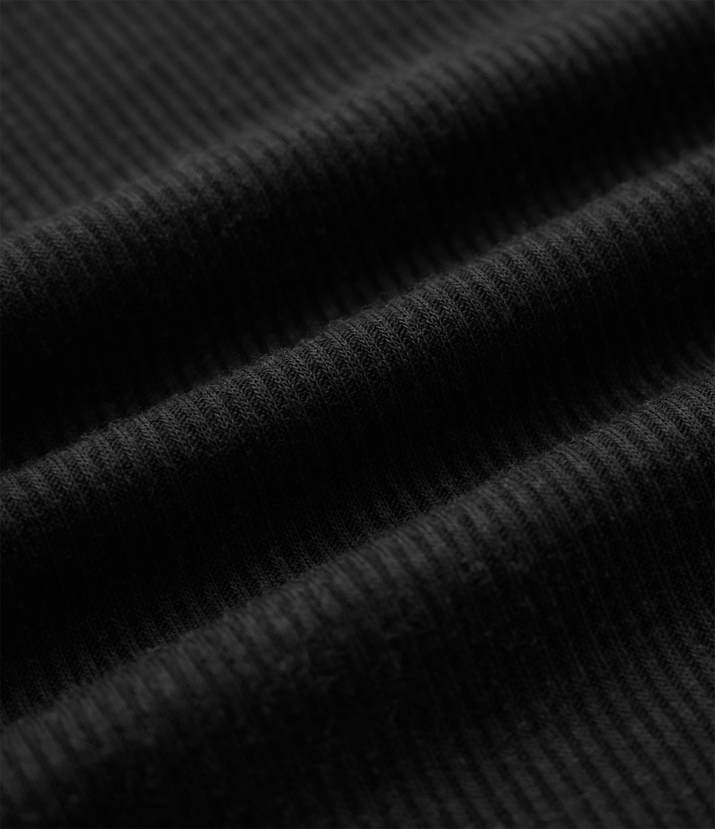 Top tailleur en mélange de laine col rond échancré à manches courtes en maille côtelée