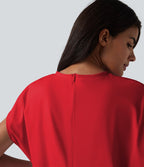 Robe de sport mini de yoga SoftlyZero™ Airy 2-en-1 effet frais InstantCool col rond à manches courtes, demi-zip et poches, accès facile Easy Peasy