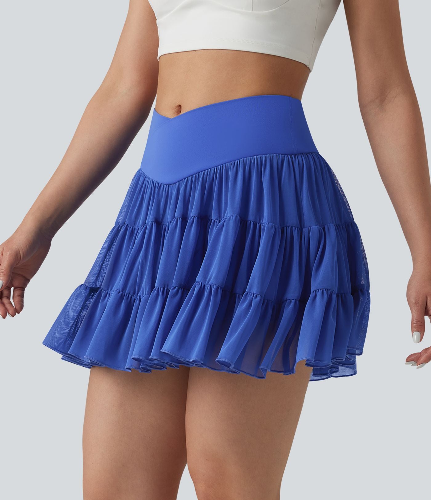 Jupe-short de tennis mini taille haute croisée fluide avec poches