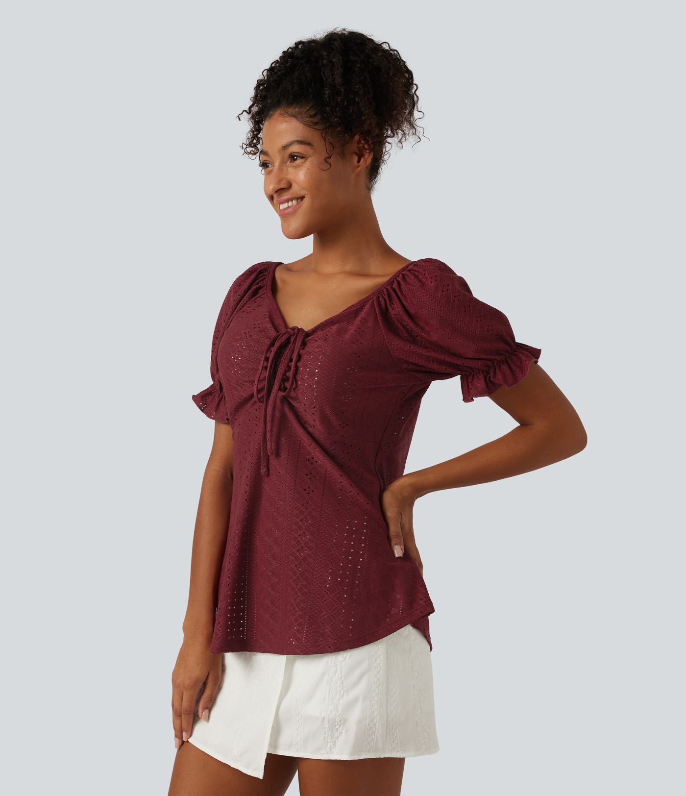 Blouse décontractée col V manches courtes bouffantes lacée ajourée