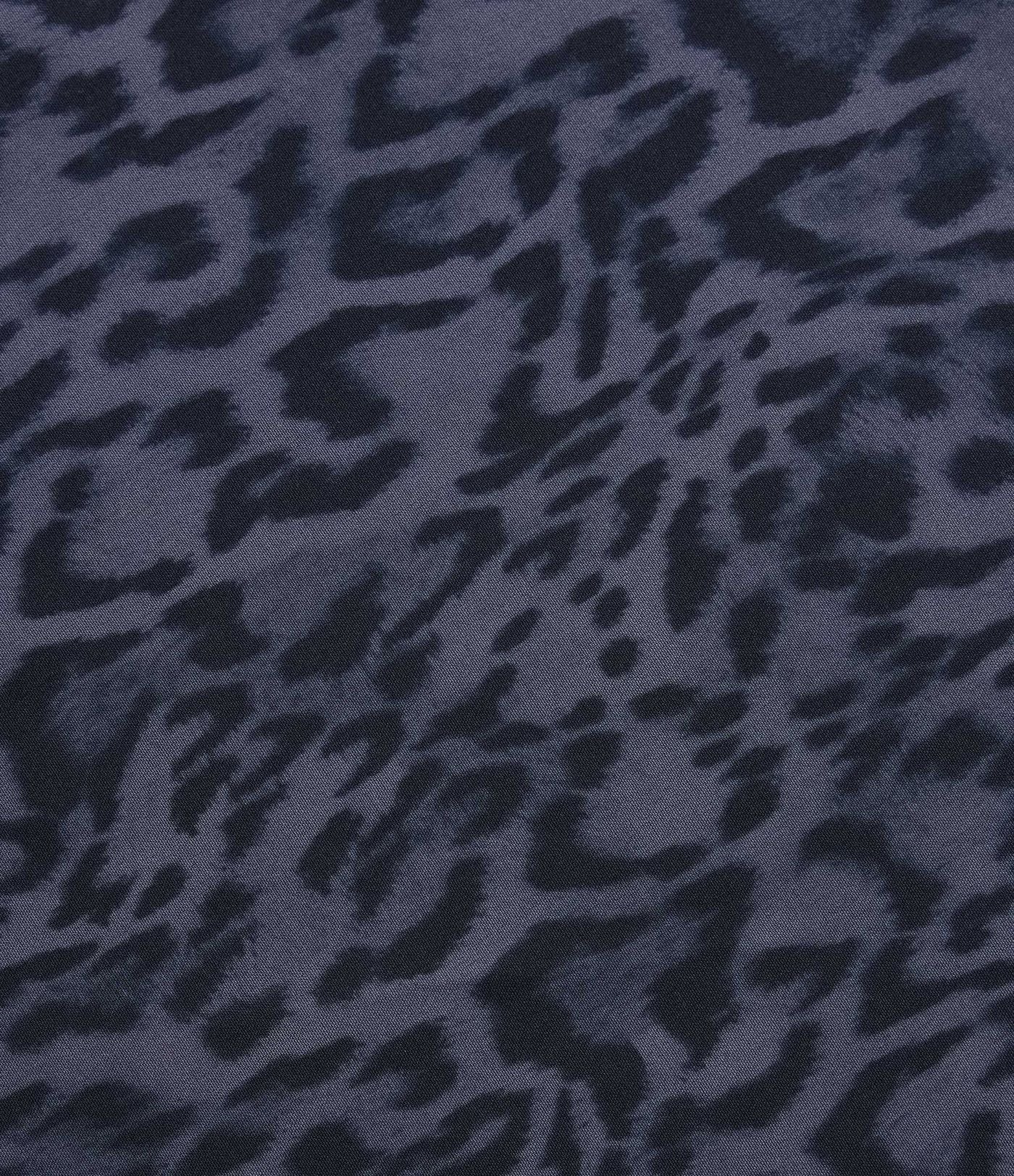 Jupe tennis mini fluide 2-en-1 taille haute imprimé léopard avec liens latéraux et poche