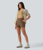 Short tailleur plissé taille haute avec poches