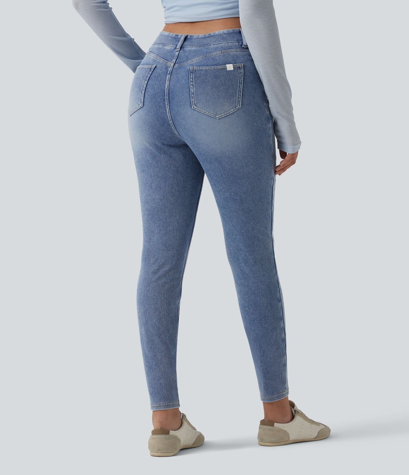 Halara Flex™ Jean 7/8 slim asymétrique taille haute croisée avec poches