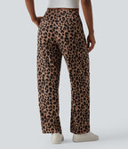 Pantalon tailleur fuselé asymétrique taille mi-haute gaufré imprimé léopard avec poches