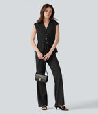 Chemise tailleur sans manches col V avec braguette boutonnée et cordon
