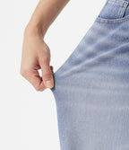 Jean baggy Halara Flex™ taille basse délavé asymétrique avec poches