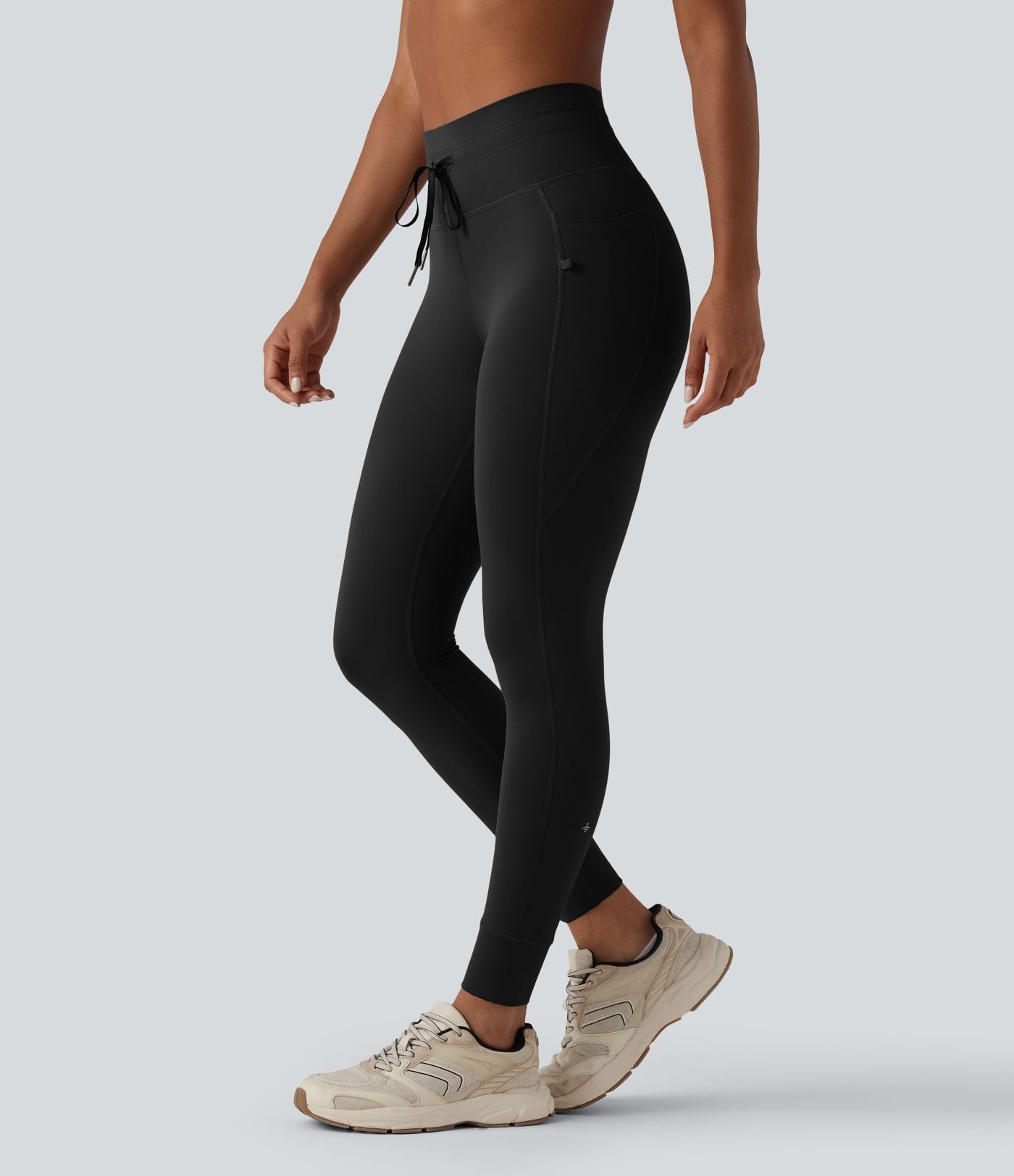 Legging 7/8 de yoga taille haute avec cordon de serrage uni et poches