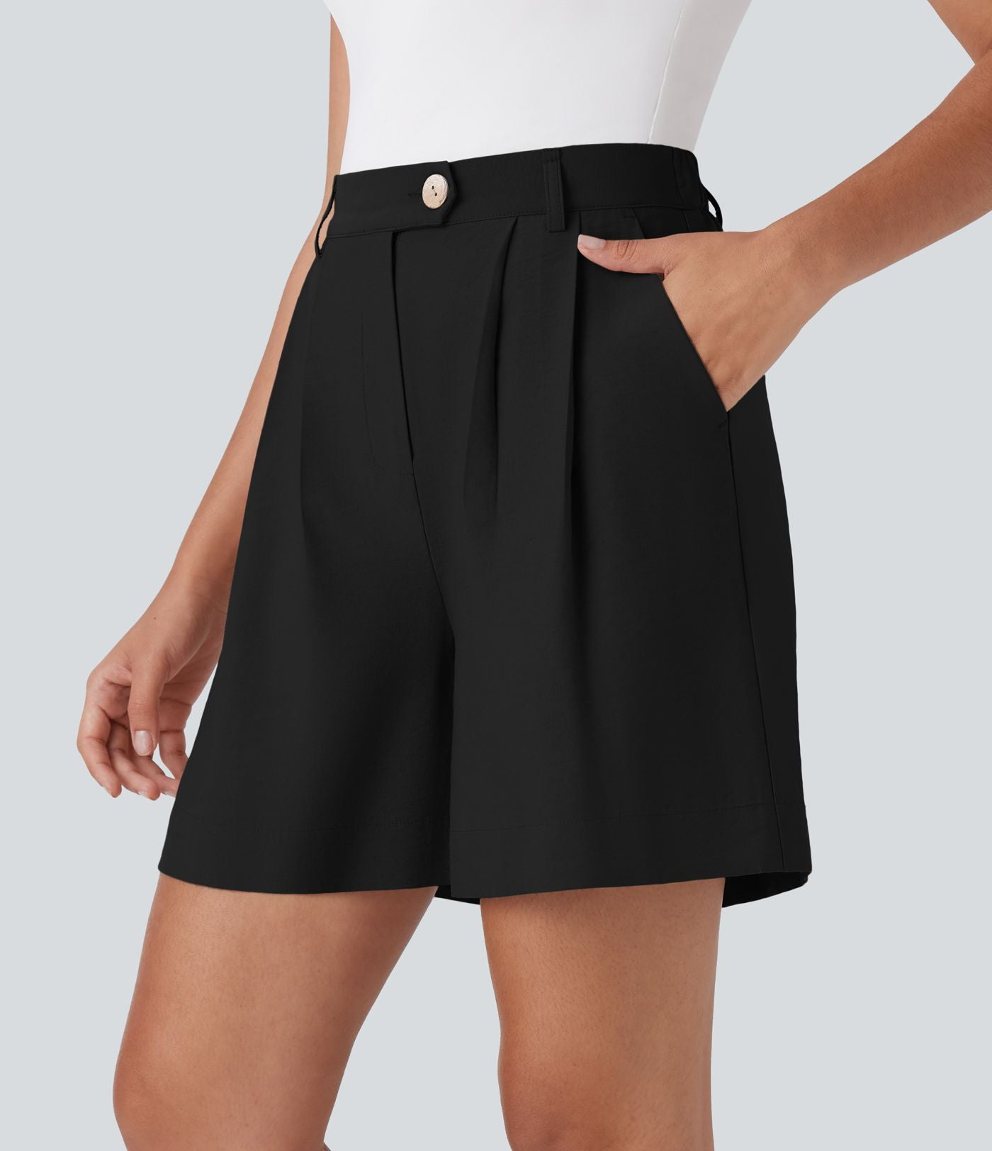 Short tailleur taille haute avec bouton, fermeture éclair et poches latérales