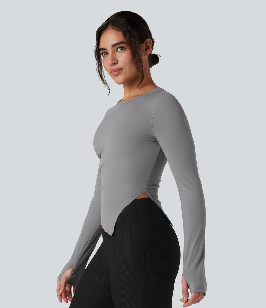 Top de sport yoga col rond ourlet asymétrique fendu manches longues avec trous pouces