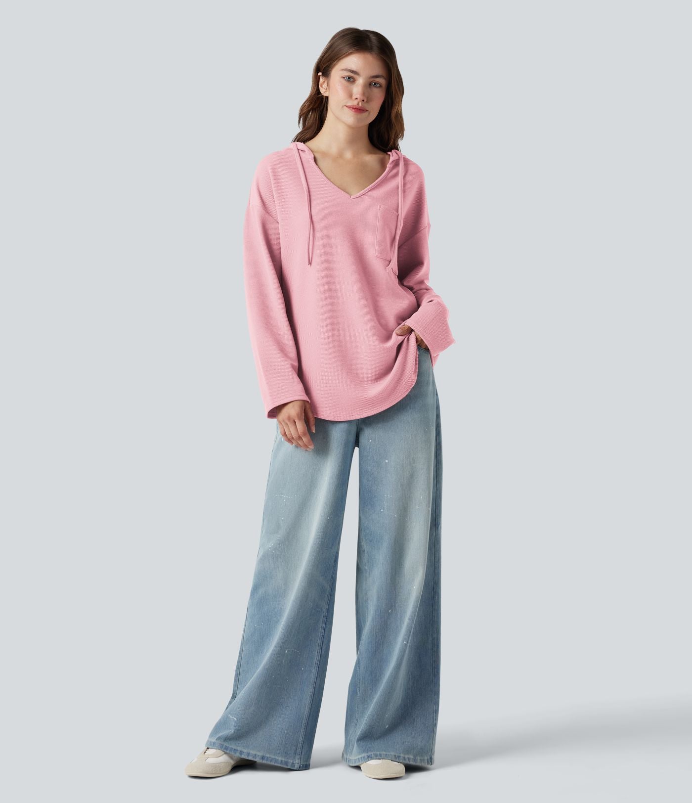 Sweat-shirt à capuche gaufré cordon de serrage manches longues ourlet arrondi avec poche