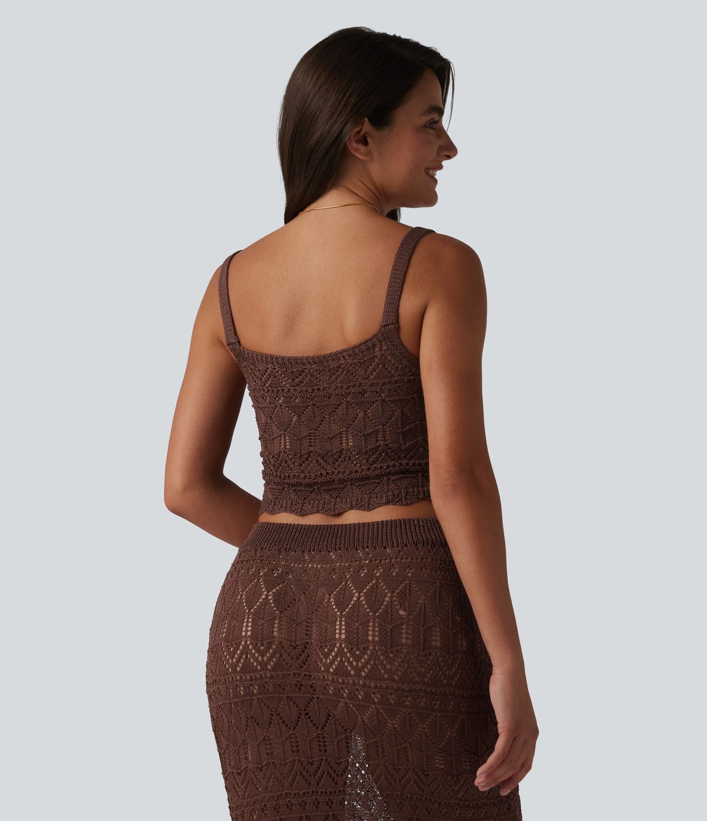 Débardeur pull crop à maille ajourée