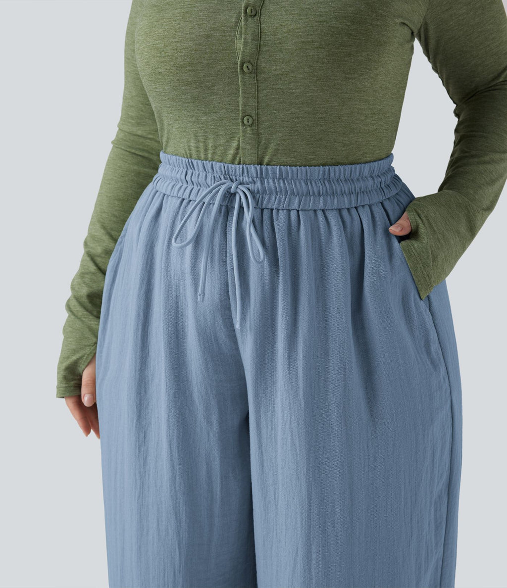 Pantalon grande taille large fluide taille haute avec cordon de serrage, poches et aspect lin