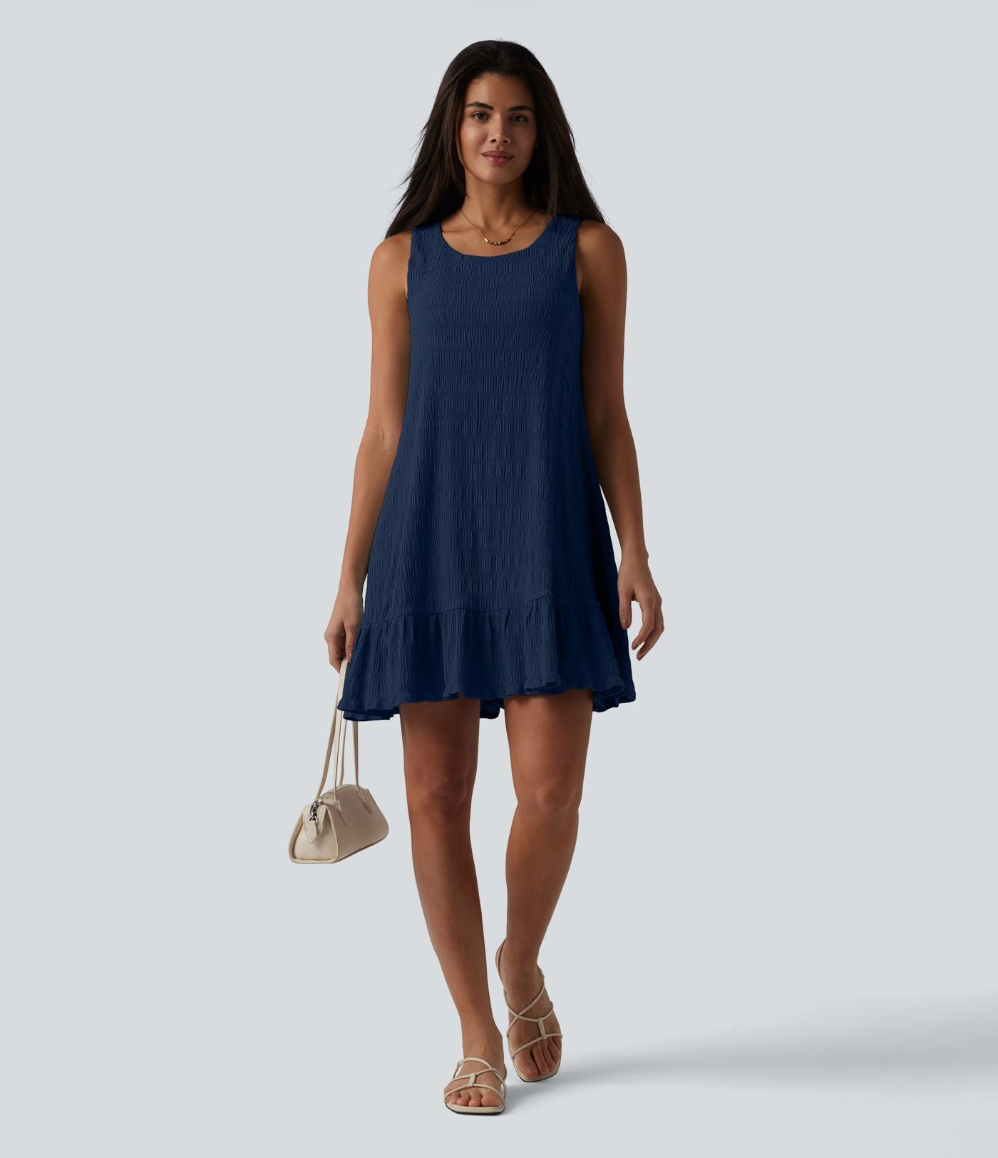 Robe courte décontractée sans manches à col rond, soutien-gorge intégré et ourlet à volants