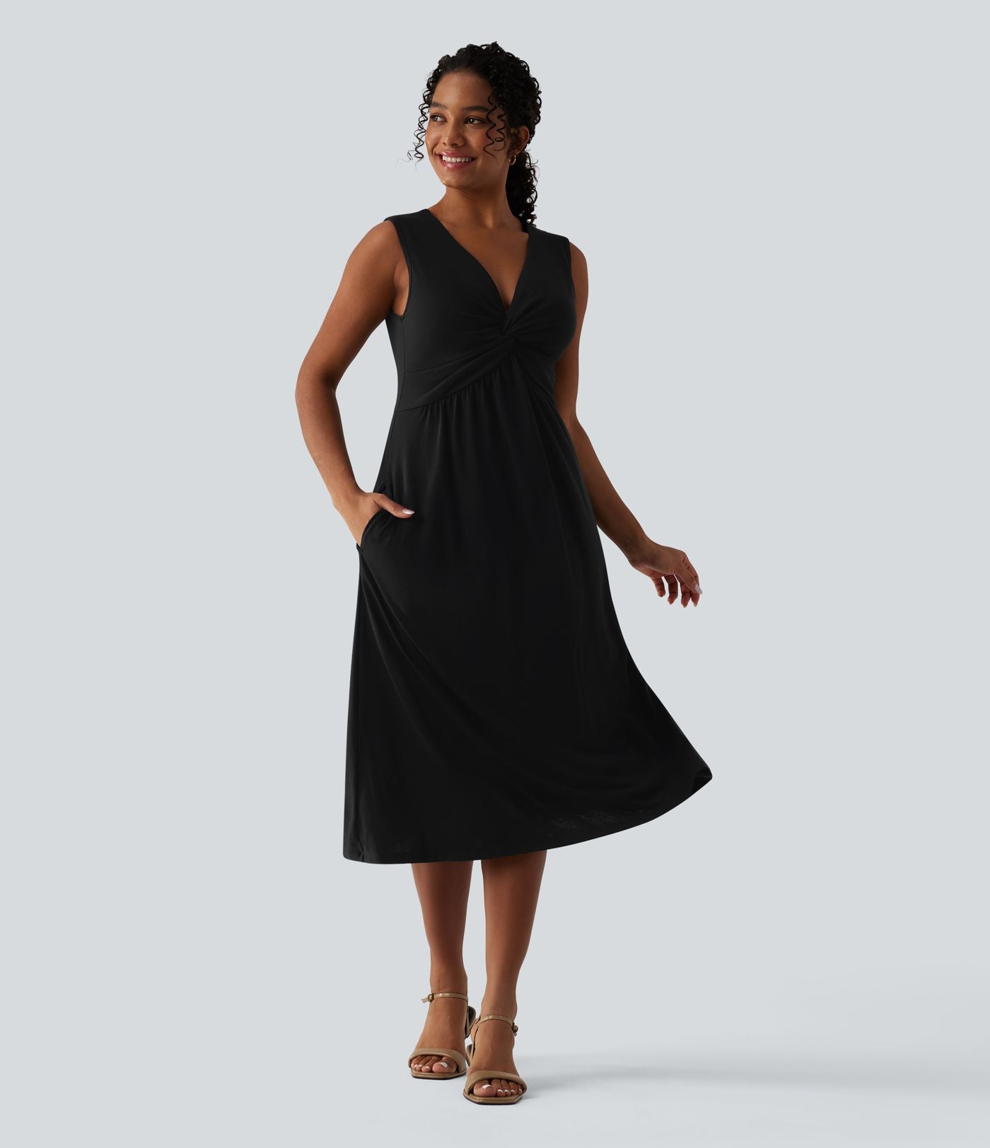 Robe midi évasée décontractée col V sans manches torsadée avec poches