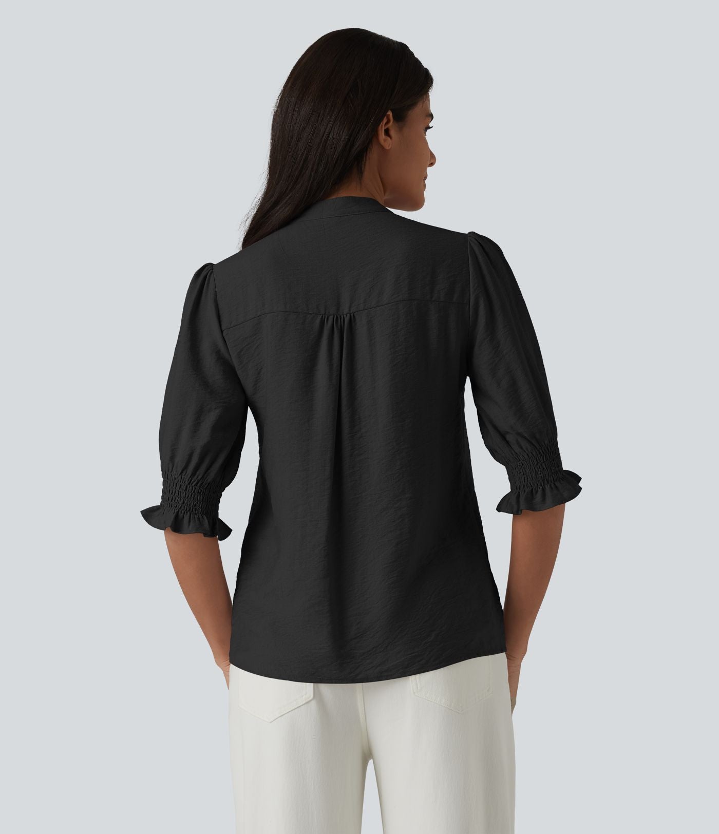 Blouse décontractée à col en V et manches courtes bouffantes