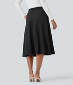 Jupe mi-longue évasée effet daim taille haute avec poches