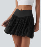 Jupe-short de tennis mini taille haute croisée fluide avec poches