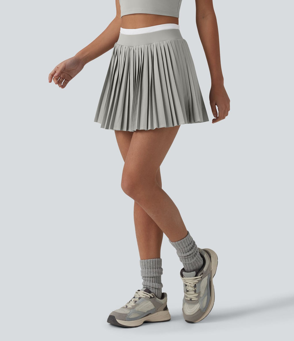Jupe mini de tennis plissée 2-en-1 Breezeful™ color block taille haute à séchage rapide avec poches