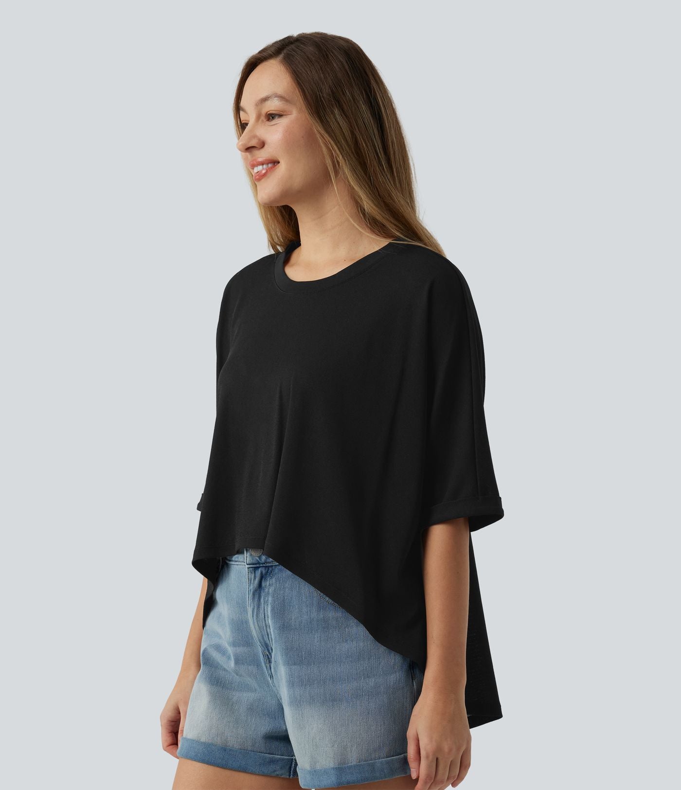 T-shirt décontracté col rond manches mi-longues ourlet asymétrique