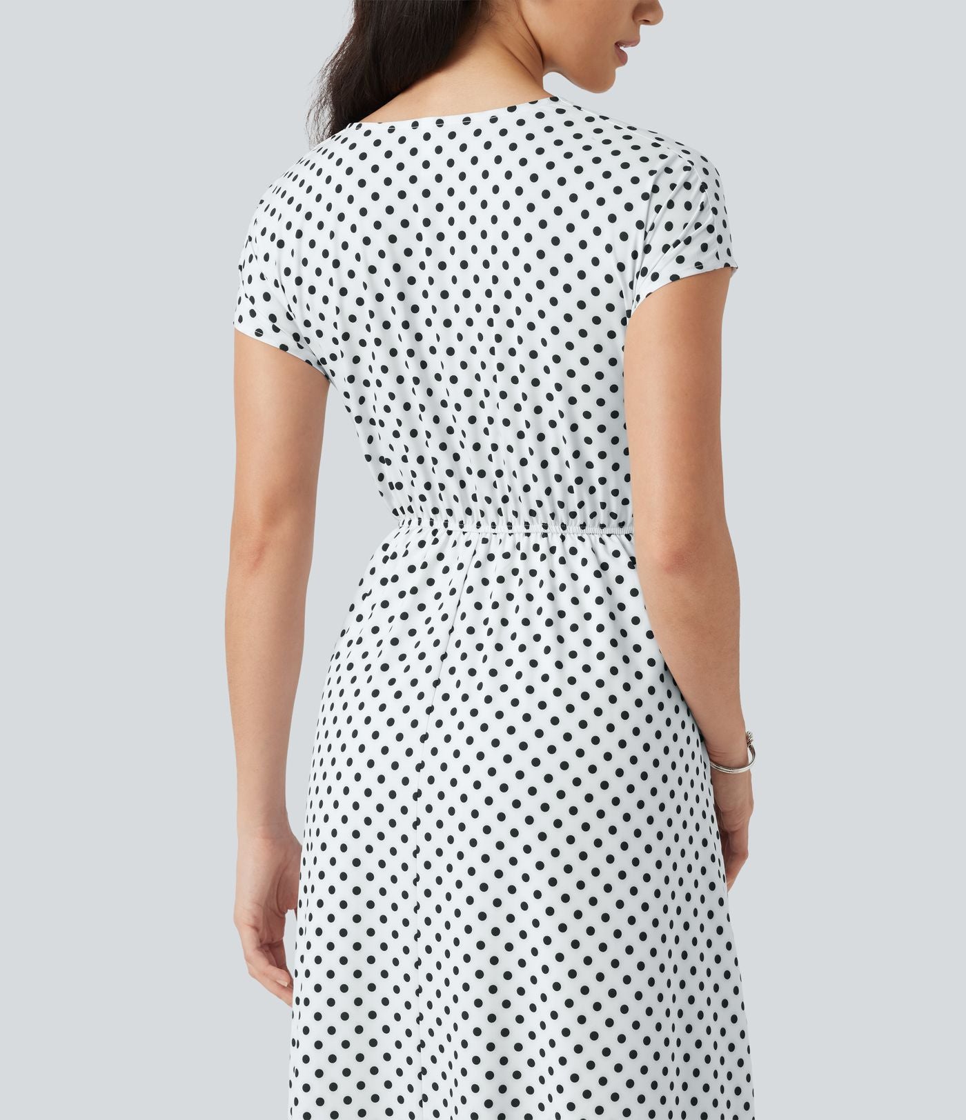 Robe midi à pois col V avec manches courtes, lien côté et poches