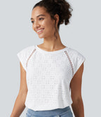 Blouse décontractée à col rond, mancherons, découpes et lien au dos
