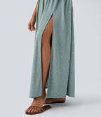 Robe longue fluide fendue avec poches latérales, dos nu et effet torsadé