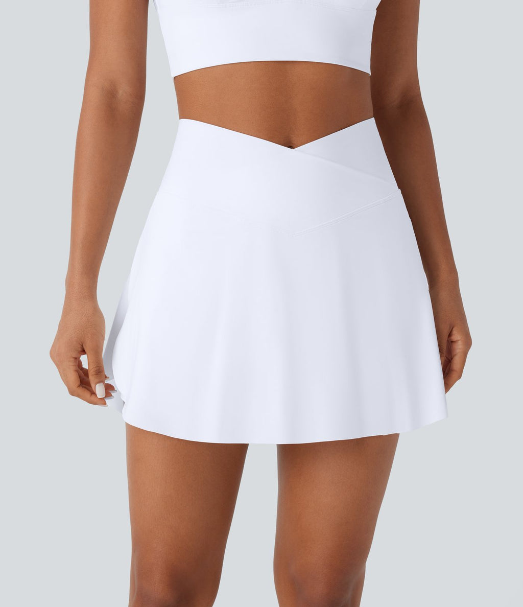 Jupe-short 2-en-1 mini de vacances taille haute croisée à séchage rapide avec poches latérales effet frais InstantCool