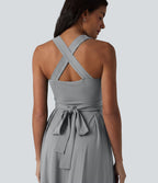 Robe midi fluide sans manches décolleté cœur avec bretelles croisées, nœud dans le dos et poches