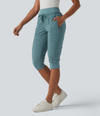 Jogging fuselé taille haute avec cordon de serrage et poches zippées