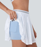 Jupe de tennis mini 2-en-1 à taille haute, color block, poches latérales, découpe plissée à effet frais InstantCool et séchage rapide
