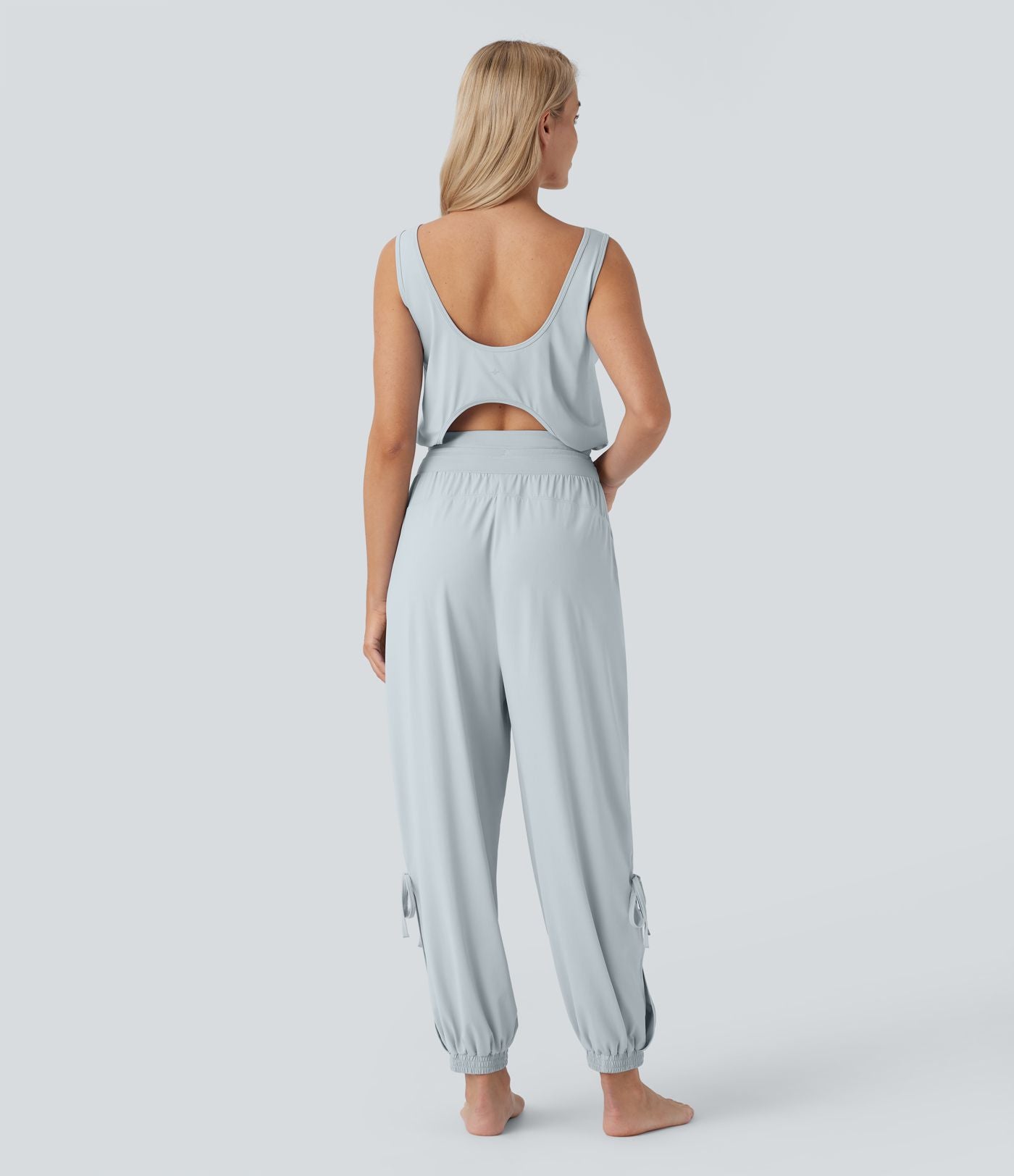 Combinaison de yoga col bateau sans manches dos nu avec découpes et poches latérales à cordon de serrage effet frais InstantCool, protection solaire UPF50+
