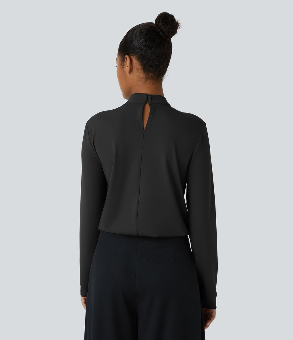 Blouse de travail à col montant, plis, boutons au dos et manches longues