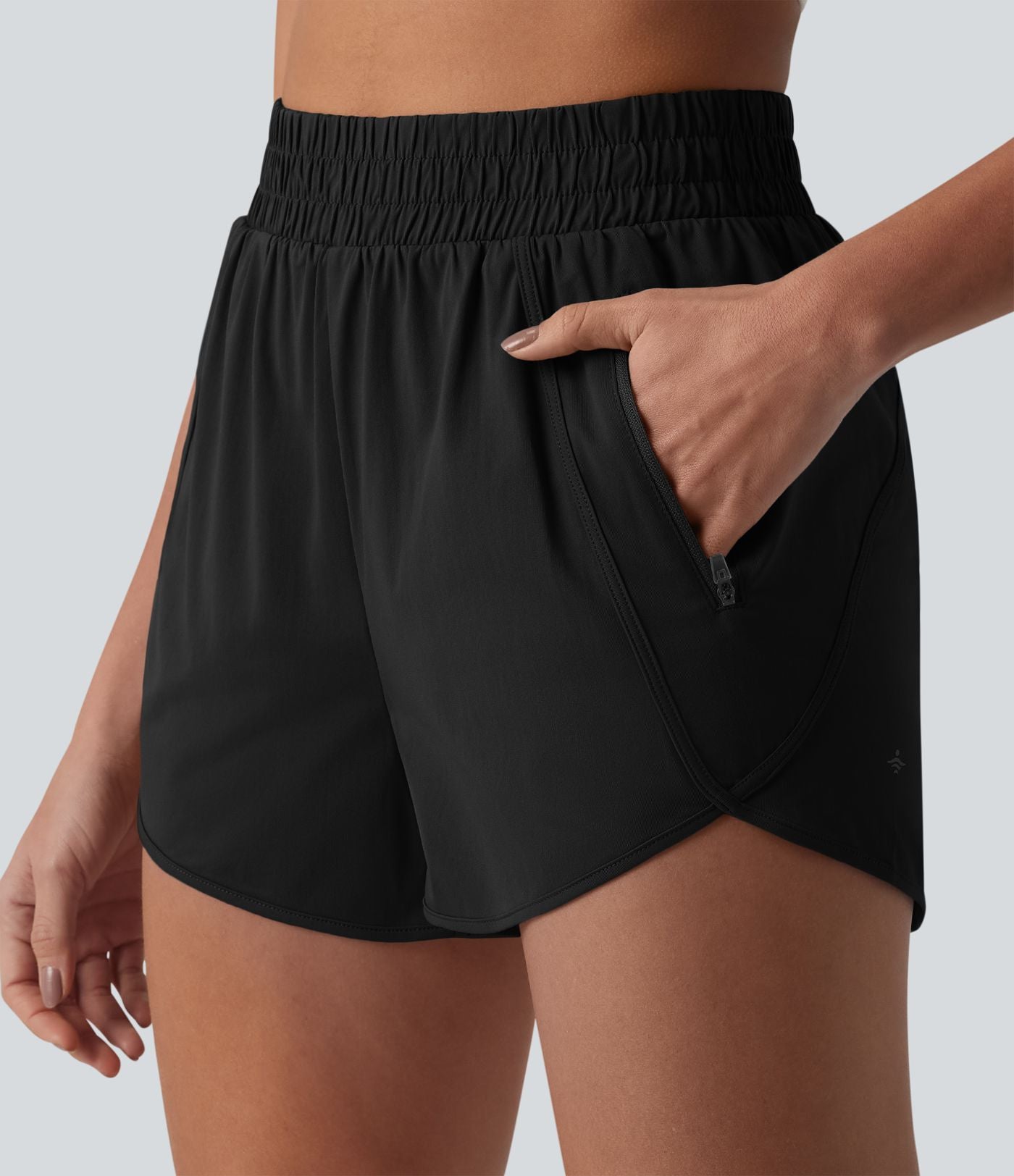 Short de yoga 7,5 cm taille haute à ourlet arrondi et poches