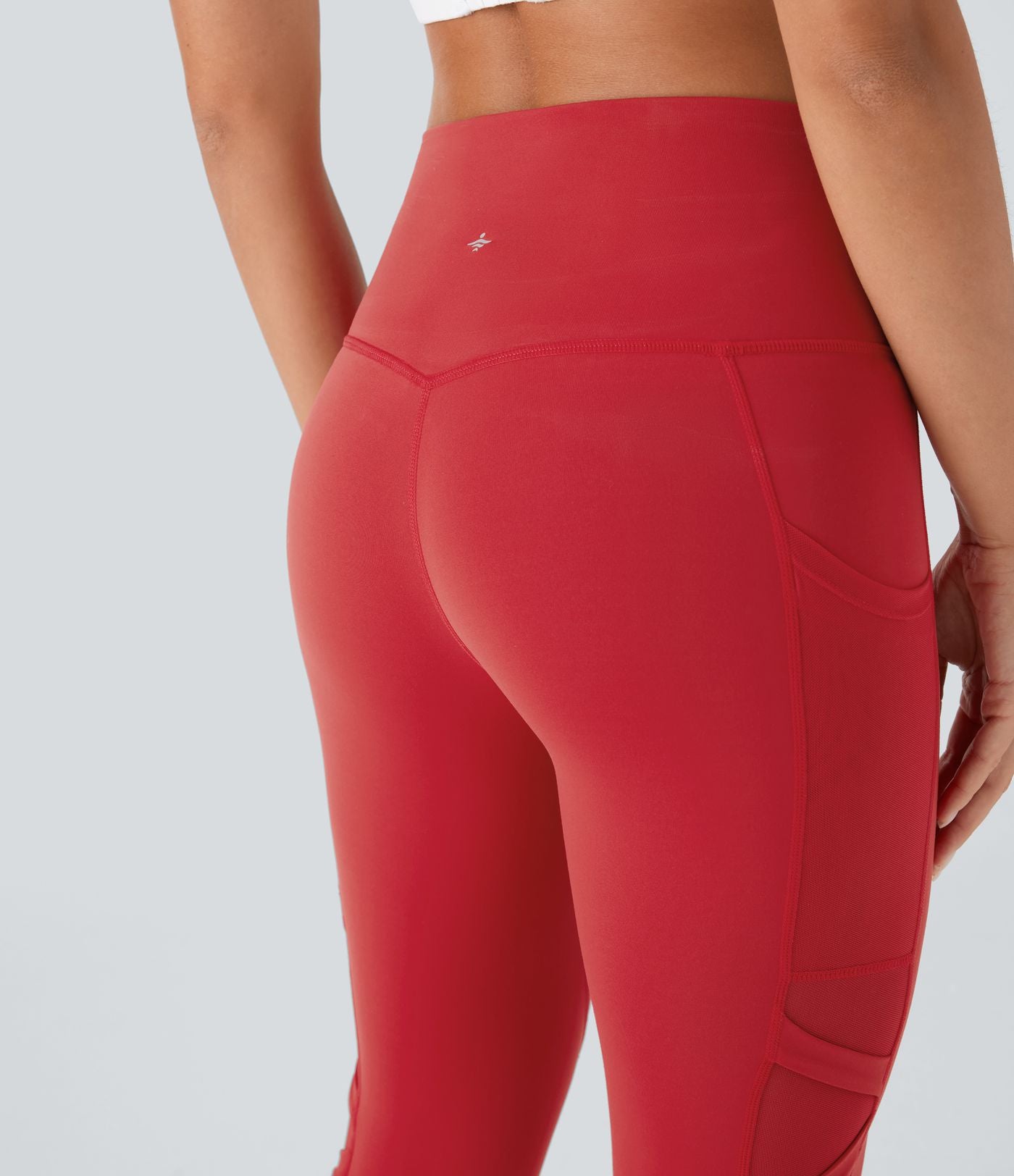Legging de yoga 7/8 SpeedWave™ taille haute avec poches latérales et empiècements en mesh contrastés à séchage rapide