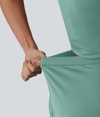 Combinaison tailleur plissée croisée col V à manches courtes avec lien noué et poches — Easy Peasy