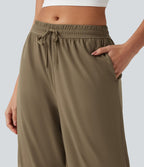 Short bouffant de danse taille basse en SoftlyZero™ à cordon de serrage avec poches - UPF50+