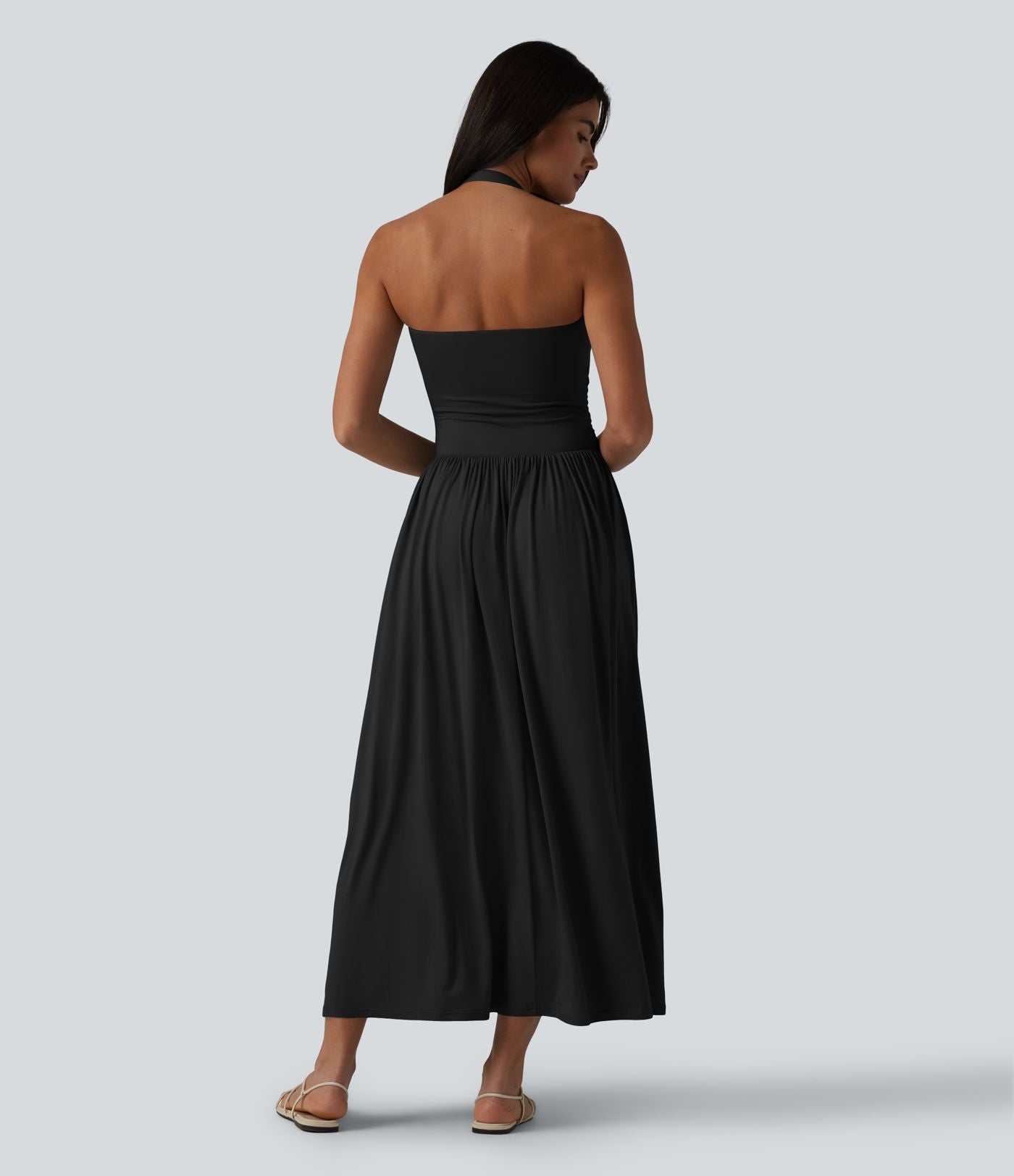 Robe longue fluide dos nu avec tour de cou, brassière intégrée et poches
