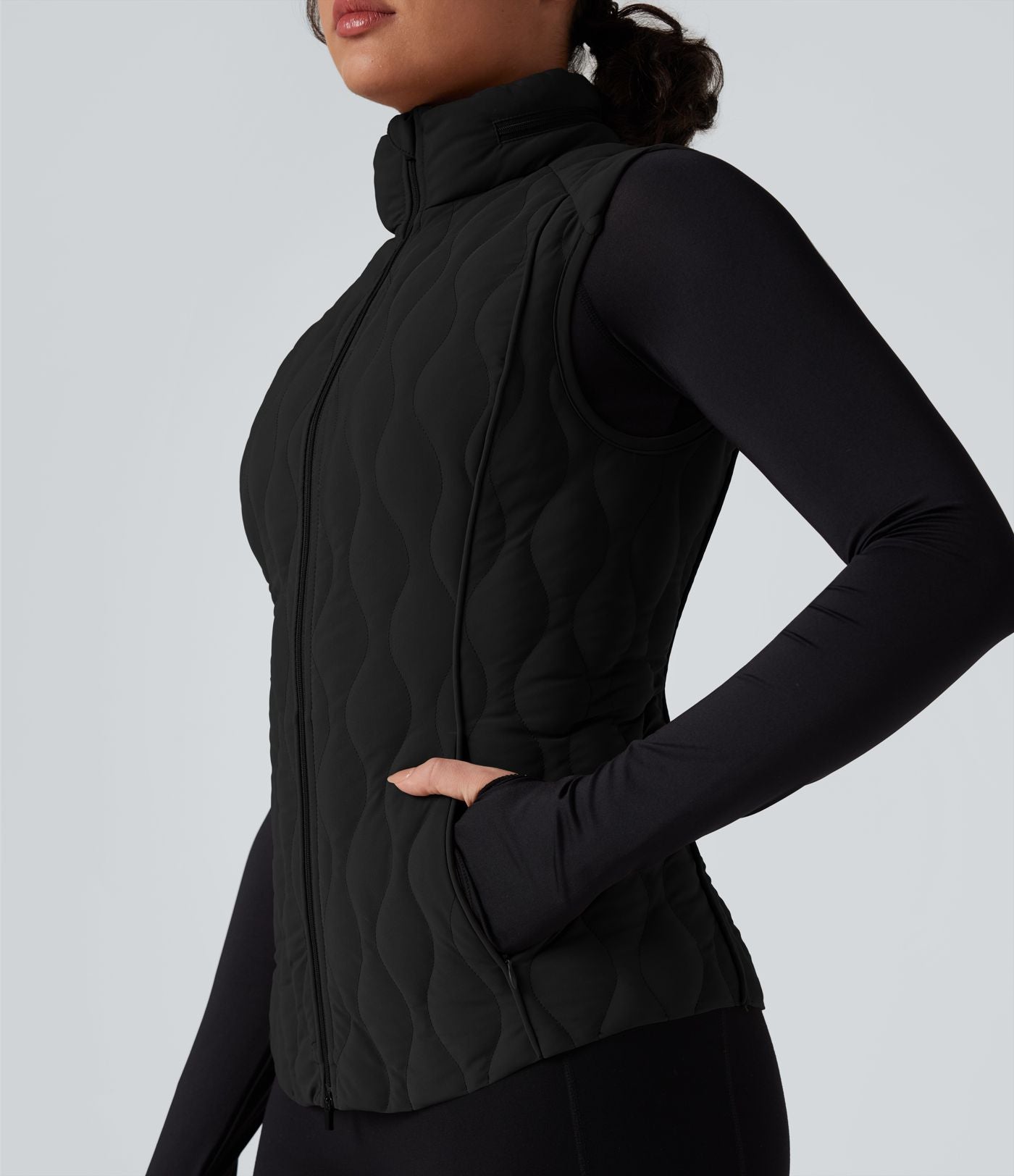Gilet matelassé running PuffFlex col montant avec zip pliable avec poches