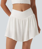 Short de running 2-en-1 taille haute croisée en tissu froissé avec ourlet fendu et poches