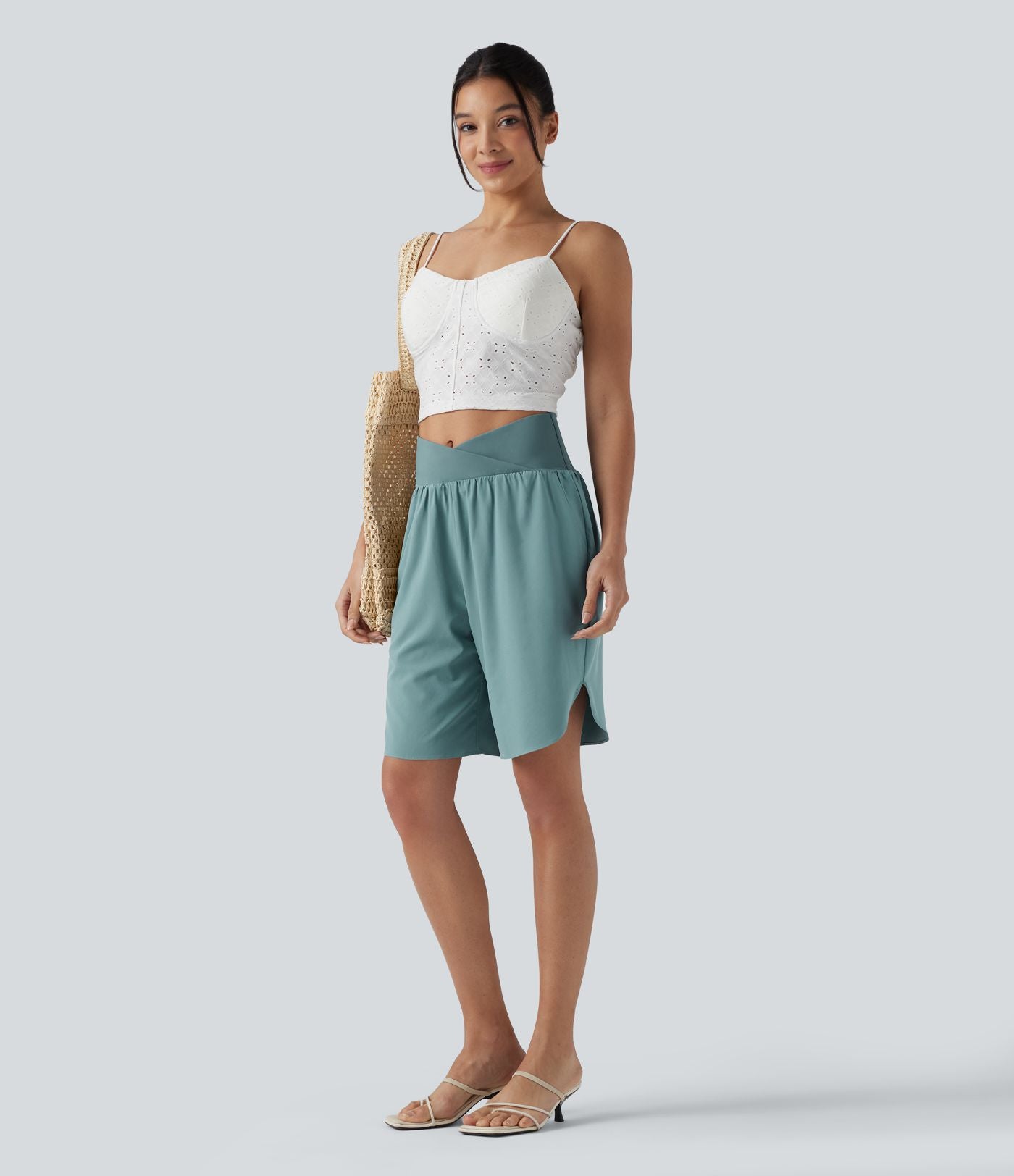 Short taille haute croisé séchage rapide avec ourlet arrondi Breezeful™ et poches