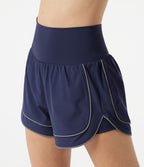 Short de yoga baggy 2-en-1 Breezeful™ taille haute à ourlet arrondi, séchage rapide, lignes réfléchissantes et poches