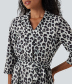 Robe-chemise décontractée imprimé léopard manches retroussables ceinturée avec poches