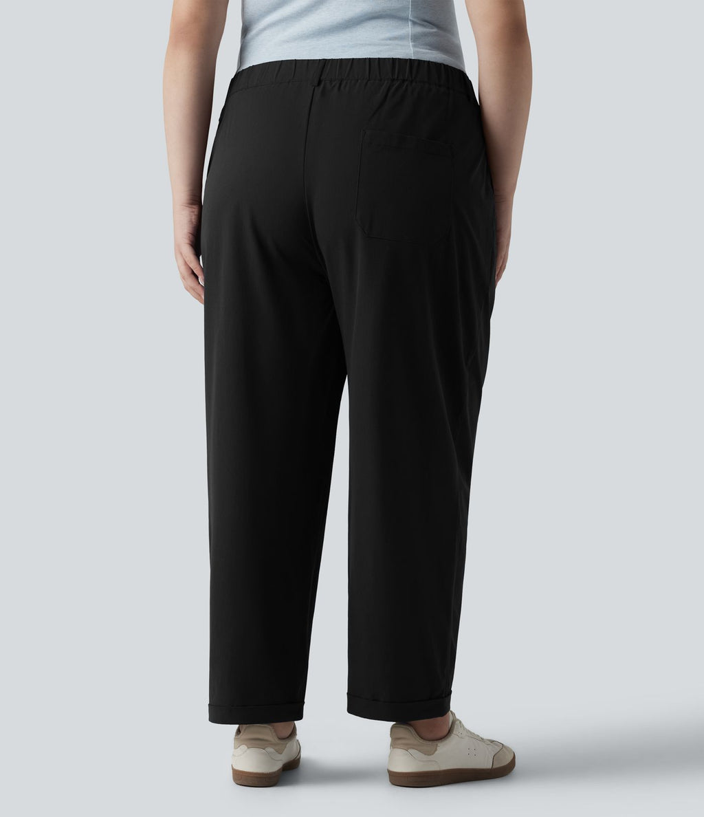 Pantalon grande taille en popeline stretch taille haute, plissé avec ourlet roulotté, longueur 7/8, coupe fuselée, avec poches