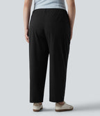 Pantalon grande taille en popeline stretch taille haute, plissé avec ourlet roulotté, longueur 7/8, coupe fuselée, avec poches