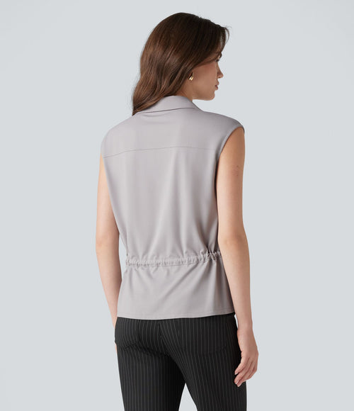 Chemise tailleur sans manches col V avec braguette boutonnée et cordon