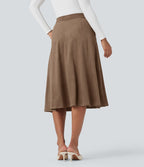 Jupe mi-longue évasée effet daim taille haute avec poches